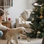 Illustration representing how to keep puppy away from christmas tree